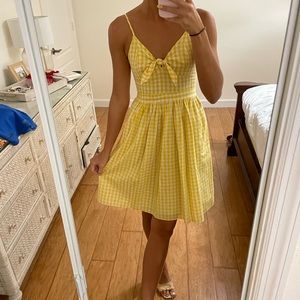 Gingham yellow front tie dress from revolve